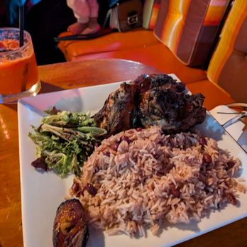 Omar's Kitchen and Rum Bar - Jerk chicken with rice and peas - Caribbean Near Me - New York, New York Omar's Kitchen and Rum Bar - Jerk chicken with rice and peas - Caribbean Near Me - New York, New York