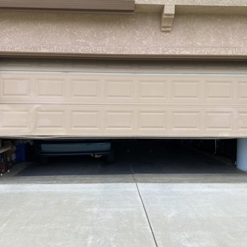 4J Sectional Doors - Before - Garage Door Services Near Me