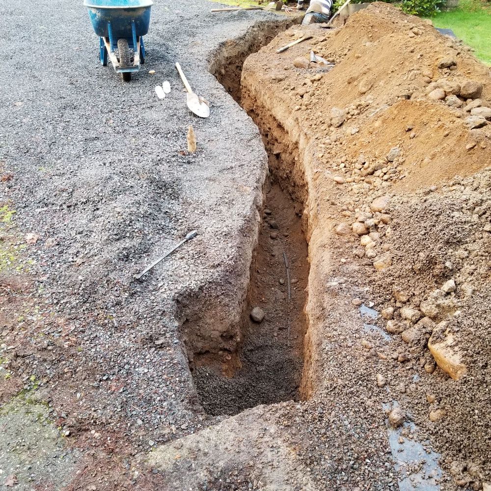 The Pipe Doctor - Excavating the damaged water line...they carefully didn't damage the fiber Internet line in the process!! - Plumbing Near Me - Seattle, Washington The Pipe Doctor - Excavating the damaged water line...they carefully didn't damage the fiber Internet line in the process!! - Plumbing Near Me - Seattle, Washington
