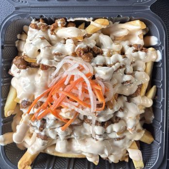 The Wandering Asian - Frytopia bowl with pork and sauce - Food Trucks Near Me - Oak Harbor, Washington The Wandering Asian - Frytopia bowl with pork and sauce - Food Trucks Near Me - Oak Harbor, Washington