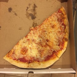 Toxic Wings - Photo of the HORRIBLE PIZZA i bought at Lorenzos of st james. Do yourself a favor & buy a box of Ellios at supermarket instead!