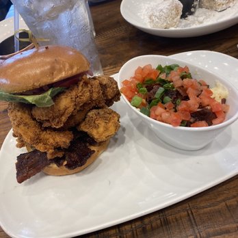 Another Broken Egg Cafe - Southern chicken sandwich with city grits - Breakfast & Brunch Near Me - Oviedo, Florida