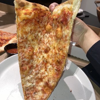 Famous Original J's Pizza - A nice large slice - Pizza Near Me - Denver, Colorado
