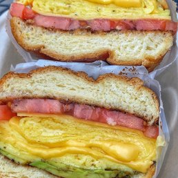 Eggs, cheese, avocado and added tomato slices