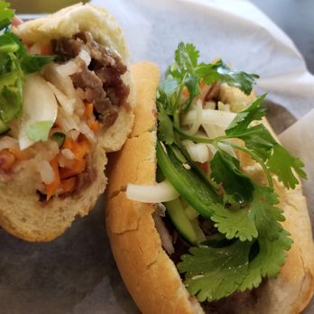 Four Sisters Grill - Pork bánh mì with jalapeño and pâté. - Vietnamese Near Me - Arlington, Virginia Four Sisters Grill - Pork bánh mì with jalapeño and pâté. - Vietnamese Near Me - Arlington, Virginia