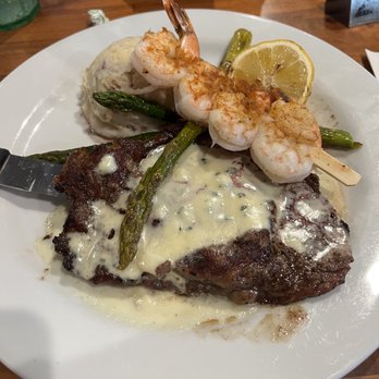 Odyssey World Cafe - Rib eye steak with shrimp. - Cafes Near Me - Paso Robles, California