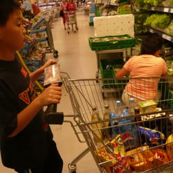 Coop Obs! - little cousin pushing the shopping cart at obs mariero. stavanger, norway