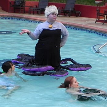 Anime Los Angeles - Some cosplayers get creative with photo opportunities on the pool deck - Performing Arts Near Me - Long Beach, California
