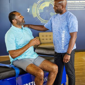 Stretch Zone - Stretch Zone performs a series of dynamic stretches to increase mobility, muscle function, and active range of motion. - Physical Therapy Near Me - Woodbridge, Virginia Stretch Zone - Stretch Zone performs a series of dynamic stretches to increase mobility, muscle function, and active range of motion. - Physical Therapy Near Me - Woodbridge, Virginia