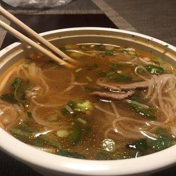 Pho Tastee - Rare steak pho with chili oil and chili paste added - Vietnamese Near Me - Huntington Beach, California Pho Tastee - Rare steak pho with chili oil and chili paste added - Vietnamese Near Me - Huntington Beach, California