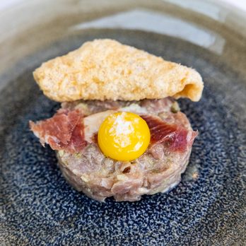 Xiquet by Danny Lledó - Tartare Ibèric: Pork Tenderloin · Paleta Ibérica · Chicharrón · Egg Yolk · Mustard · Sherry - Spanish Near Me - Washington, DC, District of Columbia Xiquet by Danny Lledó - Tartare Ibèric: Pork Tenderloin · Paleta Ibérica · Chicharrón · Egg Yolk · Mustard · Sherry - Spanish Near Me - Washington, DC, District of Columbia