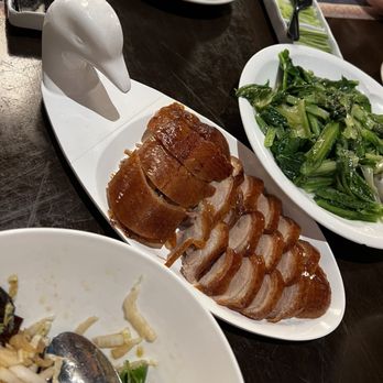 Meizhou Dongpo Restaurant - Meizhou Roast Duck (whole) the other half of the roast duck is on the other side of the table - Szechuan Near Me - Arcadia, California