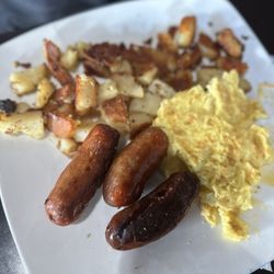 Farmer Franks - Potatoes(burnt) with scrambled eggs and Farmers Famous Sausage Breakfast