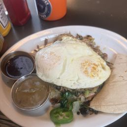 Smoked Duck Hash. Substituted bell pepper with jalepeno. Red and green chile on the side (goes best with red).