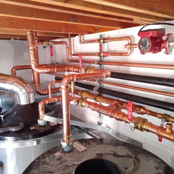 Thomas Plumbing & Heating - New water heater piping for water heaters that were moved in an apartment in Mountain View. - Plumbing Near Me - Morgan Hill, California Thomas Plumbing & Heating - New water heater piping for water heaters that were moved in an apartment in Mountain View. - Plumbing Near Me - Morgan Hill, California