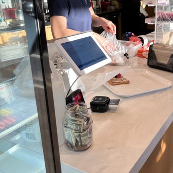 Paris Baguette - a woman at a counter - Bakeries Near Me - Bound Brook, New Jersey