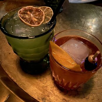Meo Bar - Yuzu Paloma on the left and charred old-fashioned on the right - Speakeasies Near Me - Houston, Texas Meo Bar - Yuzu Paloma on the left and charred old-fashioned on the right - Speakeasies Near Me - Houston, Texas