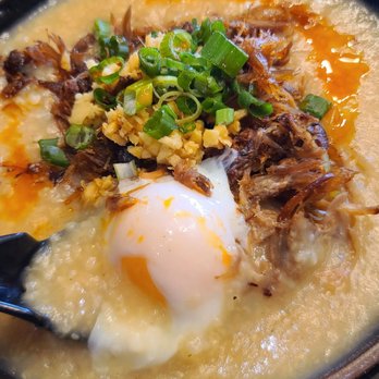 Onefold - Congee with a Poached Egg, Duck Confit, and other goodies ($15.49) 04-13-2023 - Breakfast & Brunch Near Me - Denver, Colorado Onefold - Congee with a Poached Egg, Duck Confit, and other goodies ($15.49) 04-13-2023 - Breakfast & Brunch Near Me - Denver, Colorado