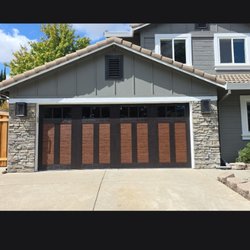 All In One Garage Doors - Clopay canyon bridge garage door turns the house into a million dollar house.