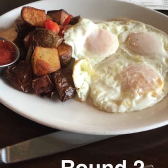 CIRCA at Clarendon - Round 2 for the big boy, ordered eggs & potatos as a second meal to fill up - New American Near Me - Arlington, Virginia