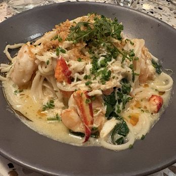 Juno & The Peacock - Lobster, crab, and shrimp over bucatini in a scampi sauce - Seafood Near Me - St. Petersburg, Florida Juno & The Peacock - Lobster, crab, and shrimp over bucatini in a scampi sauce - Seafood Near Me - St. Petersburg, Florida