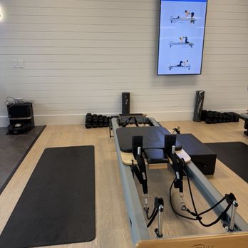 FS8 - Reformer machine with the tv showing you step by step movements - Pilates Near Me - Plantation, Florida FS8 - Reformer machine with the tv showing you step by step movements - Pilates Near Me - Plantation, Florida