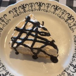Gramma D’s Cafe - Homemade peanut butter silk pie with chocolate syrup!!