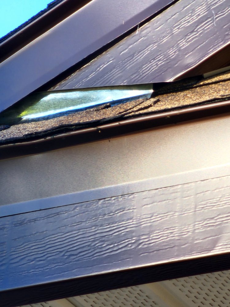 Slide of Veritas Roofers