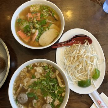 Phnom Penh Noodle Shack - Mo's Special Noodles with small rice noodles and Seafood Noodle Soup with wide flat noodles - Cambodian Near Me - Long Beach, California Phnom Penh Noodle Shack - Mo's Special Noodles with small rice noodles and Seafood Noodle Soup with wide flat noodles - Cambodian Near Me - Long Beach, California