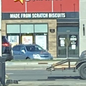 Hardee's - a truck with a broken tire in front of a hardee's store - Fast Food Near Me - Louisville, Kentucky