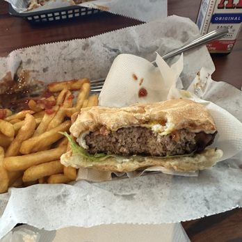 McKenna's Place - Monday Hamburger special with fries. - American Near Me - Palm Springs, Florida