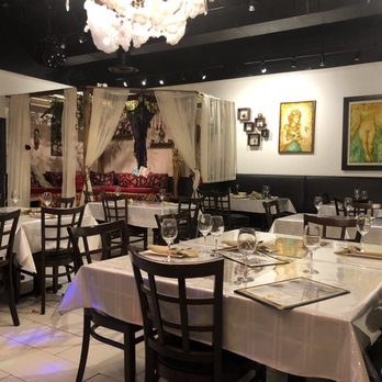 Simurgh Restaurant - a dining area with tables and chairs - Persian/Iranian Near Me - Richmond Hill, Ontario