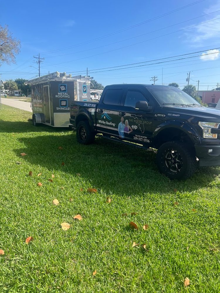Slide of Whitby Roofing