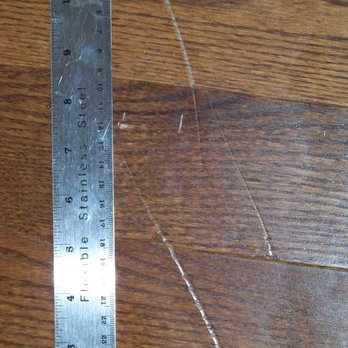 Piepho Moving & Storage - One of many scratches on our new hardwood floors - Movers Near Me - Onalaska, Wisconsin