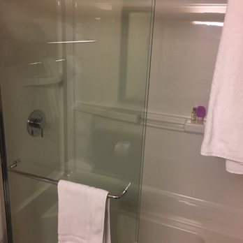 Hotel 540 - Bathroom w/ shower only.  Seat provided in shower stall.  Standard King Room. - Venues & Event Spaces Near Me - Kamloops, British Columbia