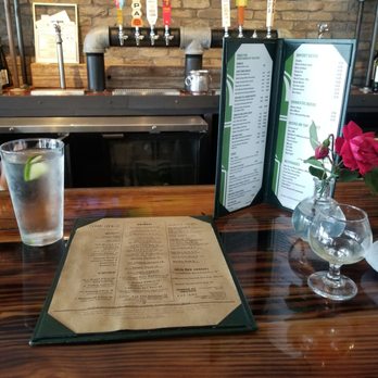 Green Mango - First seated, taste of wine in snifter - Thai Near Me - Austin, Texas