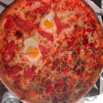 Proletariat Pizza - Half and Half. Egg and Prosciutto and The Favorite - Pizza Near Me - Seattle, Washington Proletariat Pizza - Half and Half. Egg and Prosciutto and The Favorite - Pizza Near Me - Seattle, Washington