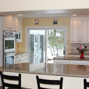 Holcomb Cabinetry - a kitchen with a center island - General Contractors Near Me - Claymont, Delaware