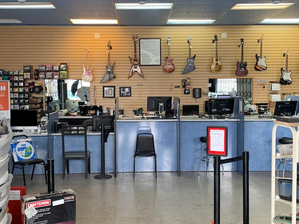 OASIS PAWN Updated September 2024 13 Photos 1001 E Main St