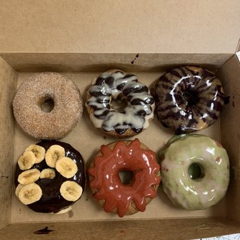 Dough House - Cinnamon, strawberry, chocolate w chocolate glaze & banana, blueberry w elderberry glaze, vanilla matcha glaze, & blueberry w espresso glaze - Donuts Near Me - Black Mountain, North Carolina