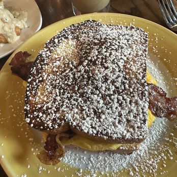 Honeycomb Cafe - French toast Sammy: scrambled eggs, hot peppered bacon and cheddar cheese between two French toast - New American Near Me - Belmont, North Carolina