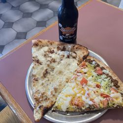 Tony's - Taco sliced pizza and chicken bacon ranch sliced pizza with a bottled root beer