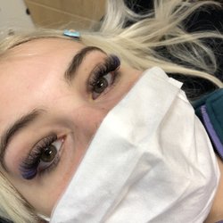 Volume lash extensions with purple accent