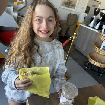 IW Coffee & Chai Bar - Happy kid w blended honey cinnamon and a bear claw. - Coffee & Tea Near Me - Palm Desert, California IW Coffee & Chai Bar - Happy kid w blended honey cinnamon and a bear claw. - Coffee & Tea Near Me - Palm Desert, California