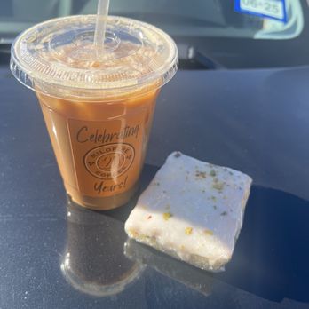 Mildfire Coffee Roasters - Iced vanilla latte and lemon pistachio cake. - Coffee & Tea Near Me - San Antonio, Texas