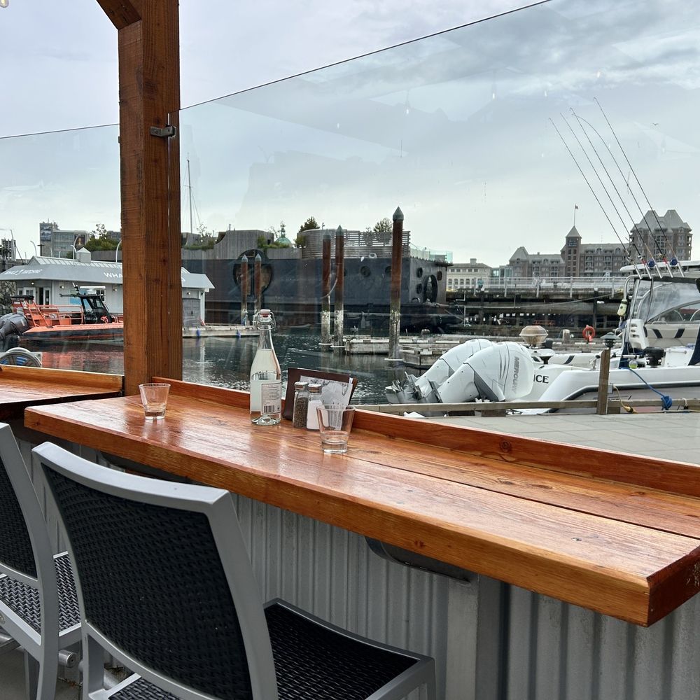 The Flying Otter - Bar seating outside w/view of harbor. - Seafood Near Me - Victoria, British Columbia The Flying Otter - Bar seating outside w/view of harbor. - Seafood Near Me - Victoria, British Columbia