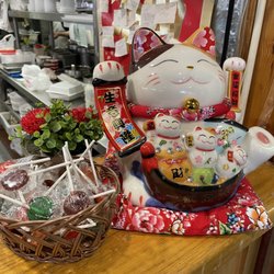 Panda Imperial - Candies and Lucky cat at Panda Imperial Chinese Restaurant.