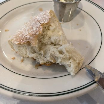 Mac's Bar & Grill - Bread with butter and I know it looks eaten but I just want to show it - Steakhouses Near Me - Arlington, Texas