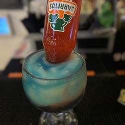 Crab City - Shark attack. Blue curaçao, margarita and jarritos fruit punch
