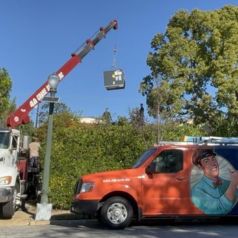 JW Heating and Air - New unit being hoisted - Heating & Air Conditioning/HVAC Near Me - Los Angeles, California JW Heating and Air - New unit being hoisted - Heating & Air Conditioning/HVAC Near Me - Los Angeles, California